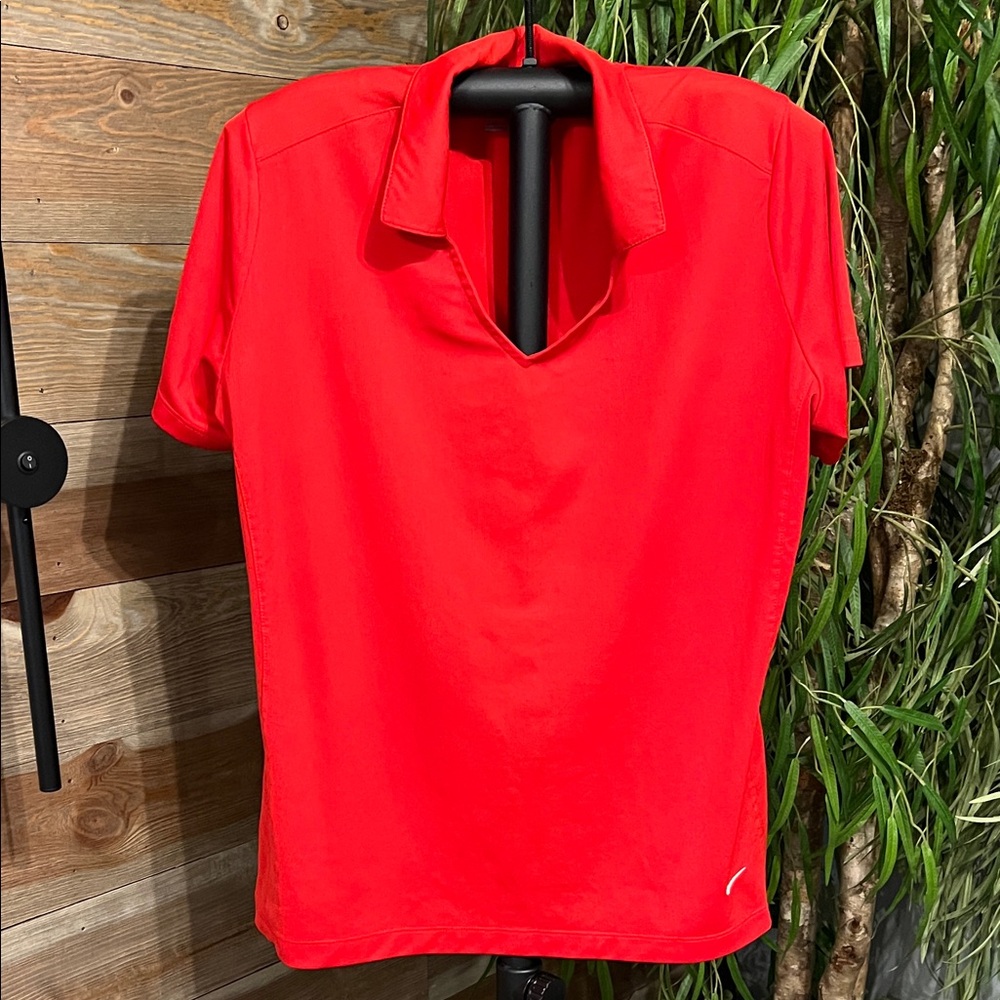 Nike short sleeved dri fit. golf polo  v necked. Red. XL